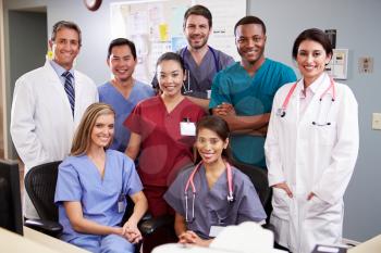 Portrait Of Medical Team At Nurses Station