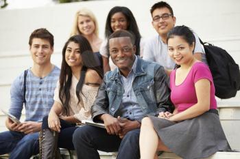 Portrait Of University Students Outdoors On Campus