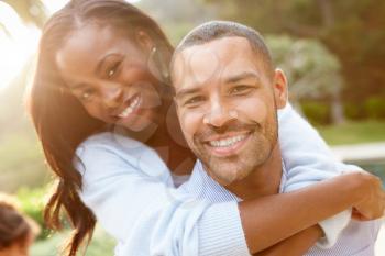 Portrait Of Loving African American Couple In Countryside