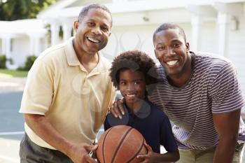 Grandfather With Son And Grandson Playing Basketball