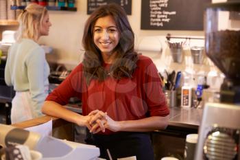 Portrait Of Two Women Running Coffee Shop Together