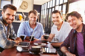 Group of men meeting at a coffee shop, portrait