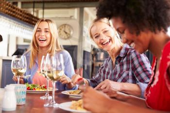 Female friends eating at a restaurant