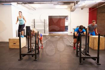 Group Of People In Gym Circuit Training