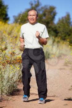 Senior man jogging
