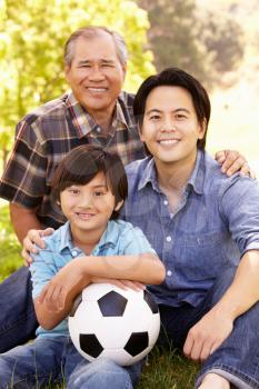 Father, grandfather and son portrait
