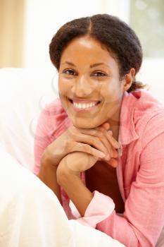 Mixed race woman at home