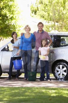 Family Washing Car Together