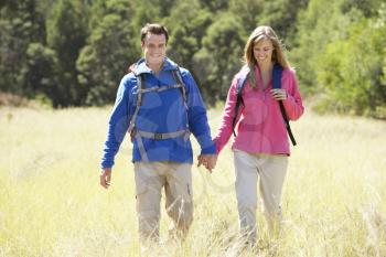 Couple On Hike In Beautiful Countryside