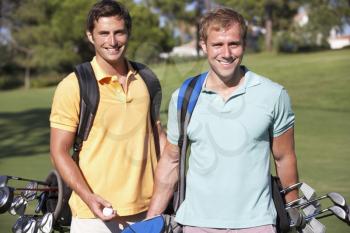 Two Men Enjoying Game Of Golf