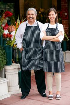 Portrait Of Male And Female Florist Outside Shop