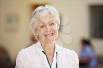 Portrait Of Female Consultant In Hospital Reception