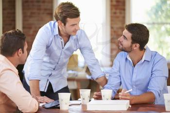 Group Of Businessmen Meeting To Discuss Ideas