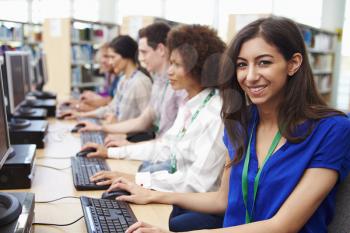 Group Of Mature Students Working At Computers