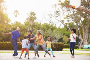 Multi Generation Family Playing Basketball Together