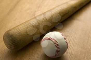 Vintage Baseball Bat And Ball On Wooden Surface