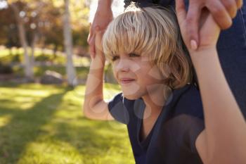 Close Up Of Mother And Son Playing In Park Together