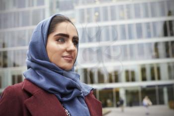 British Muslim Businesswoman Standing Outside Office