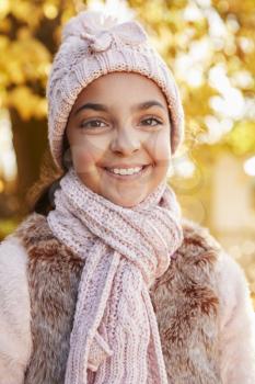 Outdoor Portrait Of Girl Wearing Hat And Scarf In Autumn