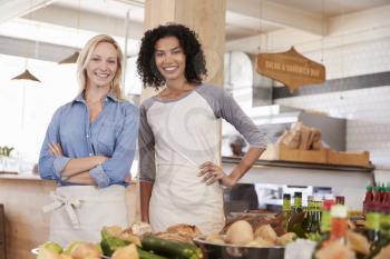 Portrait Of Female Staff In Organic Food Store