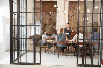 Creative business team in discussion in a meeting room