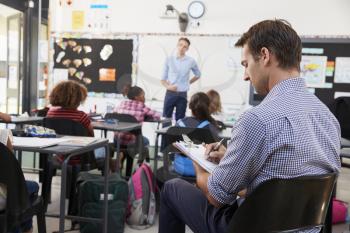 Trainee teacher learning how teach elementary students