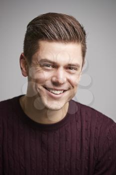 Portrait of a smiling young white man looking to camera