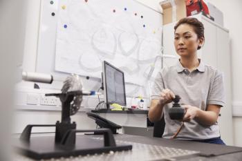 Female Engineer Uses CMM Coordinate Measuring Machine In Factory