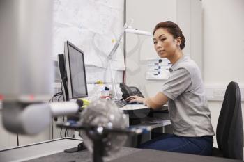 Female Engineer Uses CMM Coordinate Measuring Machine In Factory