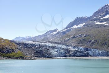 Glacier Flowing Into Lake In Alaska USA