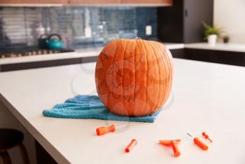 Pumpkin On Kitchen Table Ready To Be  Carved Into  Halloween Lantern