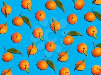 Graphic Background Pattern Of Satsumas Against Blue Background