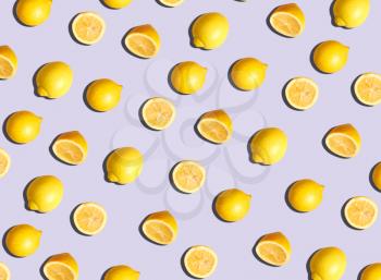 Graphic Background Pattern Of Lemons Against Purple Background