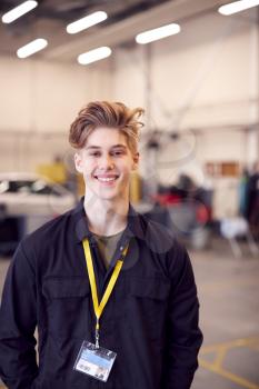 Portrait Of Male Student Studying For Auto Mechanic Apprenticeship At College