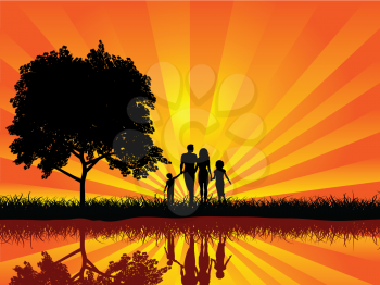 Silhouette of a family walking hand in hand