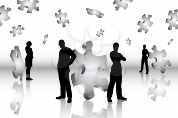Silhouettes of business people with jigsaw pieces