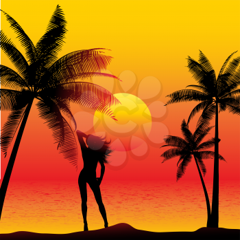 Silhouette of a female on a sunset beach with palm trees