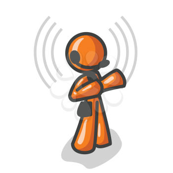 An orange man wearing a headset while talking.