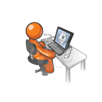 An orange man sitting at a computer desk monitoring an X ray or something random.  Also has a mouse and microphone. 