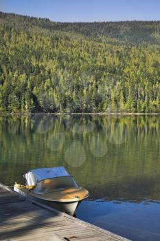 Royalty Free Photo of a Boat at a Mooring