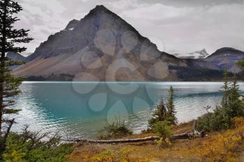  Mountain of the correct pyramidal form in northern Canada, reflected in lake