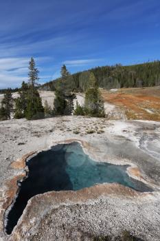 Yellowstone National Park. Famous fumaroles with hot water azure Blue Star spring