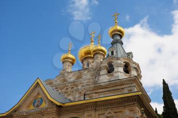 Church of Mary Magdalene in Jerusalem. Golden domes and creamy Jerusalem stone walls
