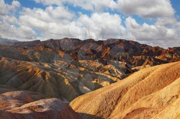 The famous section of Death Valley in California - Zabriskie Point. Magically beautiful sunset
