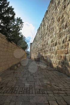 The narrow street in the old quarters of the eternal Jerusalem