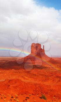 Magnificent rainbow in Monuments Valley  in reservation of Indians Navajo