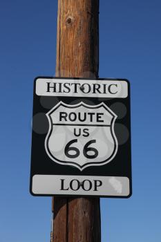 Traffic sign on the American highway, on a wooden column. Historic route 66