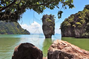 James Bond's magnificent island. Island-vase in greenish water of the southern sea. Thailand
