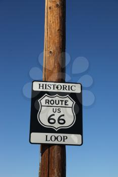 Traffic sign on the American highway, on a wooden column. Historic route 66