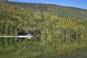  Silent fishing lake and a rash boat